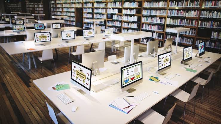 An open book shining toward a bright horizon, representing our vision for accessible lifelong learning